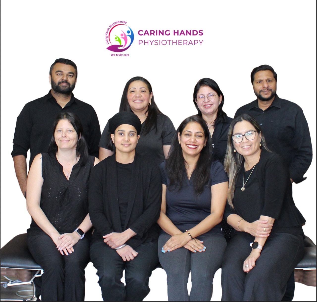 Group photo of Caring Hands Physiotherapy team in Calgary clinics