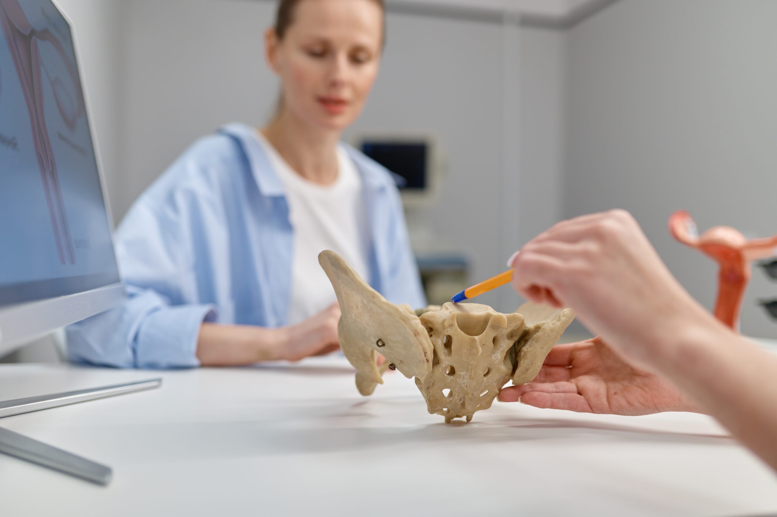 Physiotherapist explaining pelvic floor therapy and its role in bladder, bowel, and core stability